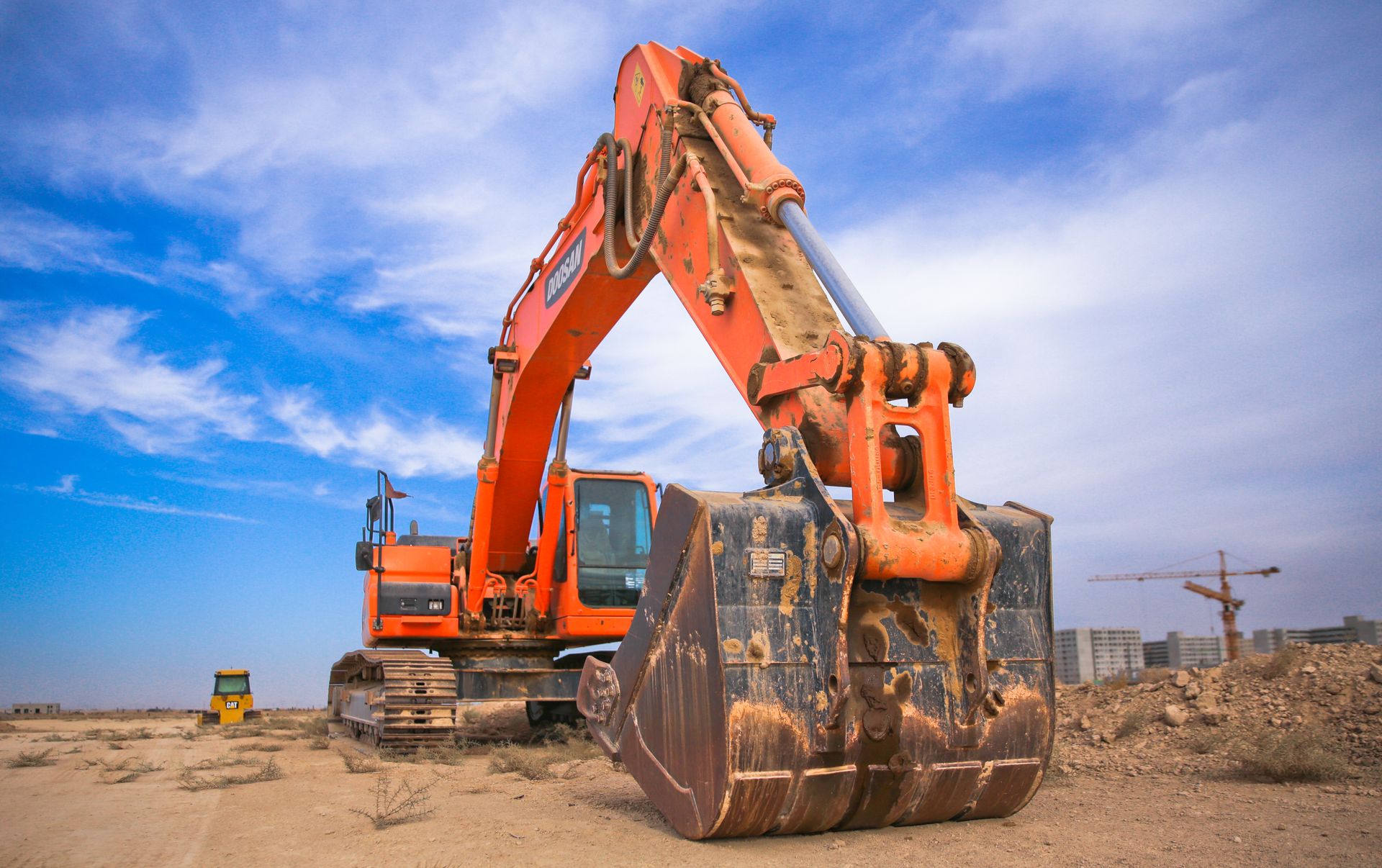 An excavator at work on a groundworks site